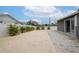 Spacious backyard with a patio and tropical landscaping at 905 69Th Nw St, Bradenton, FL 34209