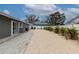 Large backyard with patio and tropical plants at 905 69Th Nw St, Bradenton, FL 34209