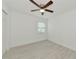Bright bedroom with ceiling fan, window, and hardwood floors at 905 69Th Nw St, Bradenton, FL 34209