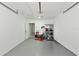 Garage with storage shelving and work bench at 905 69Th Nw St, Bradenton, FL 34209