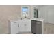 Modern white kitchen with stainless steel appliances at 905 69Th Nw St, Bradenton, FL 34209