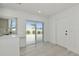 Modern kitchen with sliding door to backyard at 905 69Th Nw St, Bradenton, FL 34209