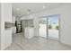 Modern kitchen with island and view to backyard at 905 69Th Nw St, Bradenton, FL 34209