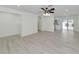 Open living space with tile floors, and access to kitchen at 905 69Th Nw St, Bradenton, FL 34209