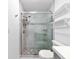 Large walk-in shower with marble tile and glass enclosure at 905 69Th Nw St, Bradenton, FL 34209