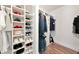 Large walk-in closet with ample shelving and hanging space at 905 69Th Nw St, Bradenton, FL 34209