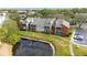 Aerial view of condo building near pond at 9100 Dr Martin Luther King Jr N St # 1302, St Petersburg, FL 33702