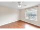 Bedroom with wood floors and large window at 9100 Dr Martin Luther King Jr N St # 1302, St Petersburg, FL 33702