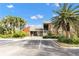 Attractive community entrance with lush landscaping and ample parking at 9100 Dr Martin Luther King Jr N St # 1302, St Petersburg, FL 33702