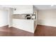 Modern kitchen features updated appliances and cabinetry at 9100 Dr Martin Luther King Jr N St # 1302, St Petersburg, FL 33702