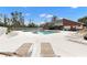 Inviting community pool with ample lounge chairs at 9100 Dr Martin Luther King Jr N St # 1302, St Petersburg, FL 33702