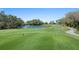 Scenic golf course view with a pond and lush green landscape at 9610 Club South Cir # 4301, Sarasota, FL 34238