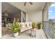 Outdoor balcony with seating area and access from bedroom at 1000 San Lino Cir # 1032, Venice, FL 34292