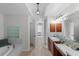 Elegant bathroom with soaking tub, double vanity, and updated fixtures at 1000 San Lino Cir # 1032, Venice, FL 34292