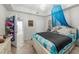 Bright bedroom featuring a comfy bed and ample closet space at 1000 San Lino Cir # 1032, Venice, FL 34292