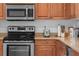 Stainless steel appliances and granite countertops in kitchen at 1000 San Lino Cir # 1032, Venice, FL 34292