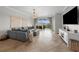 Relaxing living room with sectional sofa and access to patio at 1000 San Lino Cir # 1032, Venice, FL 34292