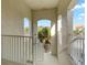 Interior condo stairwell with white railings and natural light at 1000 San Lino Cir # 1032, Venice, FL 34292