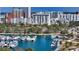 Aerial view of a high-rise condo building near a marina at 101 S Gulfstream Ave # 16J, Sarasota, FL 34236