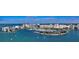 Aerial view of waterfront property, showcasing the building and marina at 101 S Gulfstream Ave # 16J, Sarasota, FL 34236
