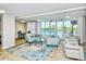 Comfortable common area with elegant furniture and access to a pool at 101 S Gulfstream Ave # 16J, Sarasota, FL 34236