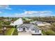 Aerial view of a single-Gathering home with water access at 10155 Hallendale Dr, Port Charlotte, FL 33981