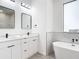 Bathroom with double vanity, soaking tub and marble shower at 10155 Hallendale Dr, Port Charlotte, FL 33981