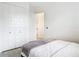 Cozy bedroom with a queen-size bed and built-in closet at 10155 Hallendale Dr, Port Charlotte, FL 33981