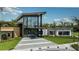 Modern community center with glass facade and landscaping at 10514 Eclipse St, Sarasota, FL 34241