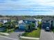 Two-story house with gray siding and paver driveway at 10916 Copperlefe Dr, Bradenton, FL 34212