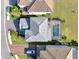 Aerial view of a house with a pool and landscaped yard in a residential neighborhood at 10916 Copperlefe Dr, Bradenton, FL 34212