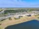 Aerial view of homes near a lake at 10916 Copperlefe Dr, Bradenton, FL 34212