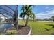 Landscaped backyard with pool and scenic view at 10916 Copperlefe Dr, Bradenton, FL 34212