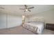 Bright bedroom featuring a comfortable bed and en-suite bathroom access at 10916 Copperlefe Dr, Bradenton, FL 34212