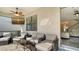 Relaxing lanai with comfortable seating and view of living area at 10916 Copperlefe Dr, Bradenton, FL 34212