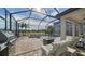 Expansive pool and spa with fire pit and grill at 10916 Copperlefe Dr, Bradenton, FL 34212