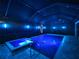 Enclosed pool and spa with lighting at 10916 Copperlefe Dr, Bradenton, FL 34212