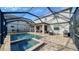 Large pool and spa with patio and seating area at 10916 Copperlefe Dr, Bradenton, FL 34212