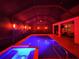 Enclosed pool and spa with lighting and seating area at 10916 Copperlefe Dr, Bradenton, FL 34212