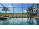 Relaxing pool with spa and lake view at 10916 Copperlefe Dr, Bradenton, FL 34212