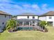 Newly renovated pool with screened enclosure and lush landscaping at 10916 Copperlefe Dr, Bradenton, FL 34212
