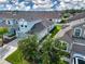 Aerial view of a light blue house in a neighborhood at 11728 Meadowgate Pl, Bradenton, FL 34211