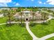 Aerial view of community clubhouse and landscaping at 11728 Meadowgate Pl, Bradenton, FL 34211