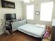 Cozy bedroom with a bed and TV at 11992 Blazing Star Dr, Venice, FL 34293