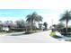 Residential community entrance with landscaped medians and gated entry at 11992 Blazing Star Dr, Venice, FL 34293