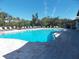 Enjoy this community pool with surrounding lounge chairs at 11992 Blazing Star Dr, Venice, FL 34293