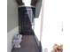 Covered entryway with a screened door and brick flooring at 11992 Blazing Star Dr, Venice, FL 34293
