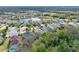 Aerial view of neighborhood with lake at 12338 Lavender Loop, Bradenton, FL 34212
