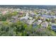 Aerial view of neighborhood with lake at 12338 Lavender Loop, Bradenton, FL 34212