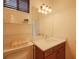 Bathroom features vanity, toilet and shelving at 12338 Lavender Loop, Bradenton, FL 34212
